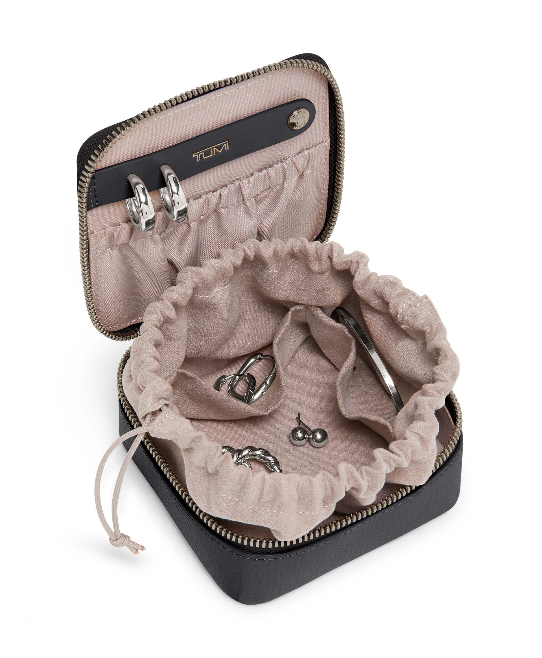 Tumi coin case top